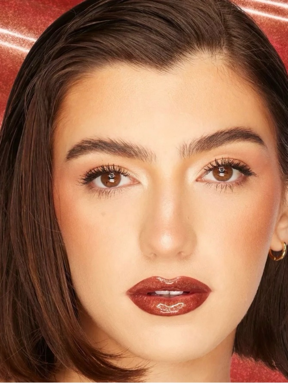 tarte Maracuja Juicy Lip Vinyl - shimmering cinnamon spice. .095 oz